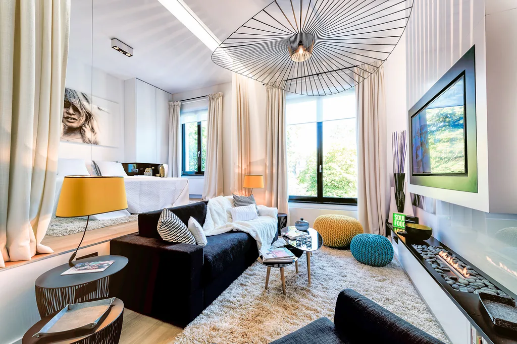 Open-plan living and sleeping area at Aqueduc 2, furnished apartment in Brussels