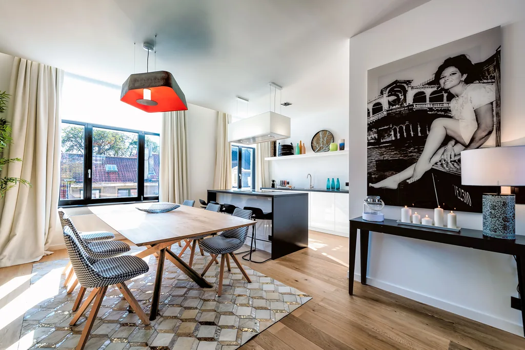 Salle à manger et cuisine d’Aqueduc 4, appartement meublé à Bruxelles
