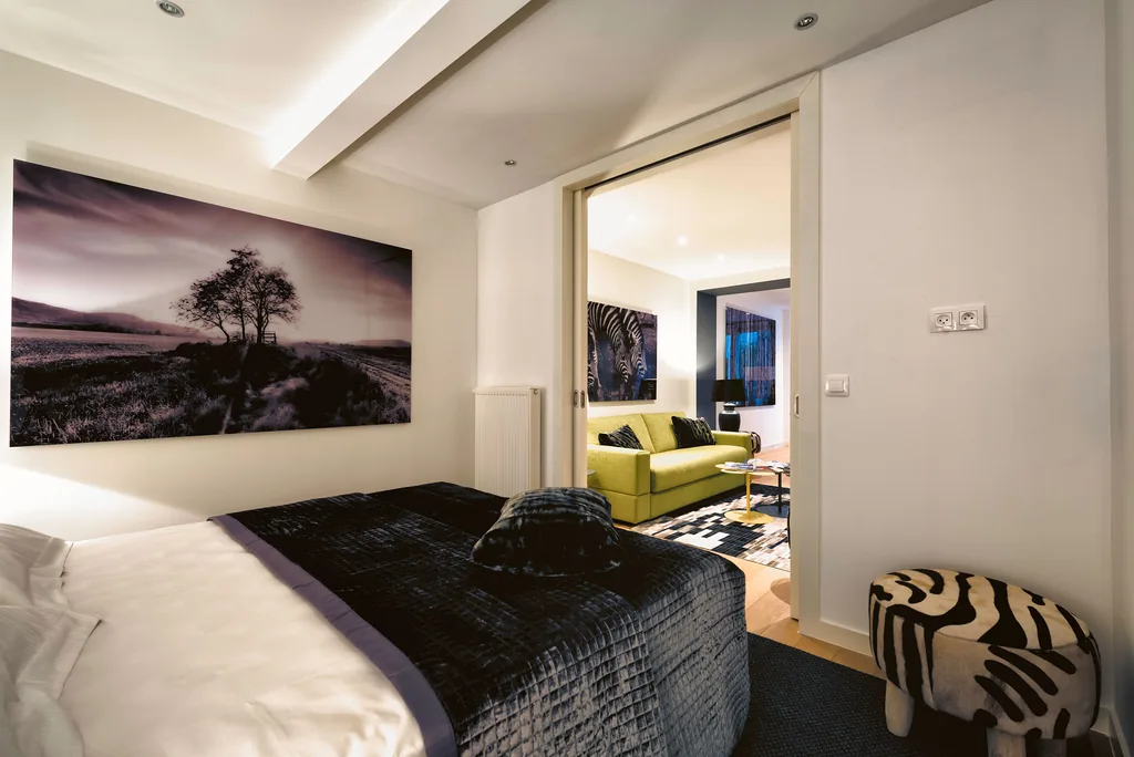 Chambre et séjour de Paul Lauters 1, appartement meublé à Bruxelles
